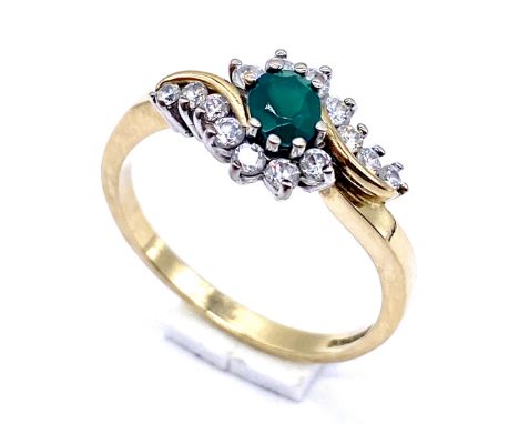A 9ct gold emerald and cubic zirconia cluster ring, size P - overall weight 2.6g