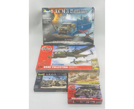 A collection of five boxed Revell & Airfix military plastic model kits including a limited edition Revell D-Day LCM 3 50ft La