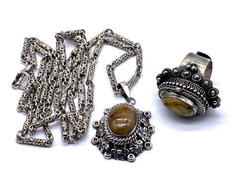 A 925 silver ring with hinged hardstone compartment along with a similar pendant on long filigree chain