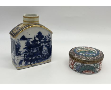An Oriental trinket box with character to base along with a Chinese blue, white and gilded tea caddy