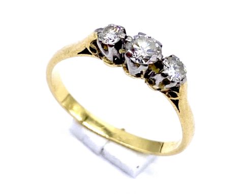 An 18ct gold diamond three stone ring, size K