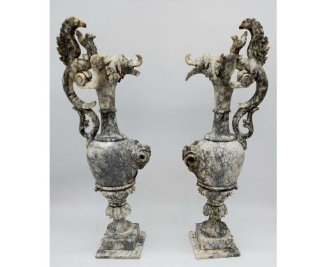 A pair of vintage Carrara marble ewers with carved decoration, both A/F, 54cm high.