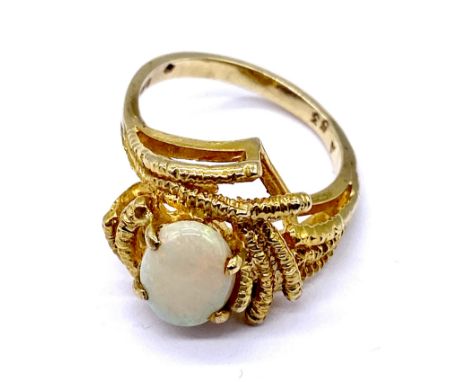 A 9ct gold ring set with an opal, total weight 4.5g, size L 1/2