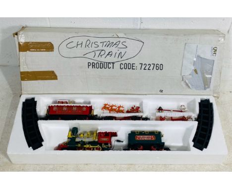 A boxed 1992 O gauge Christmas NorthPole Express animated train set by Toy State Industrial Ltd comprising of an engine, tend