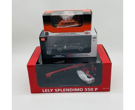 A boxed Universal Hobbies Lely Splendimo 550P Trailed Power Mower die-cast model, along with a boxed Kuhn FC 3125 DF Lift Con