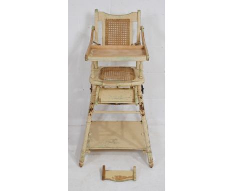 A vintage painted wooden metamorphic child's high chair, with cane seat and back rest - one part loose but present