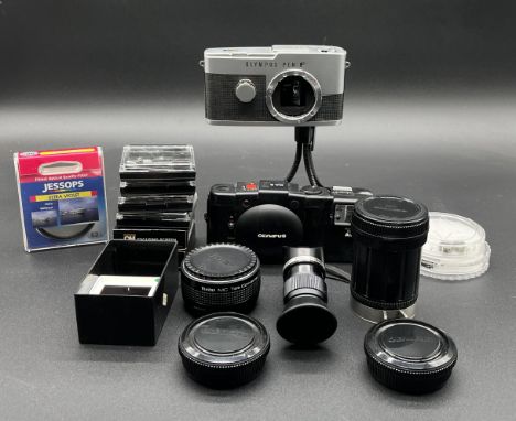 A vintage Olympus - Pen F Camera No.144678 (shutter works at time of listing but otherwise untested), along with an Olympus X