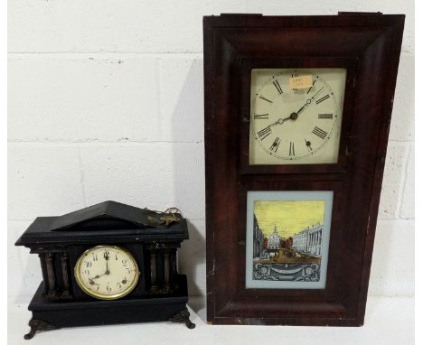 An American 8-day wall clock and an ebonised mantle clock.