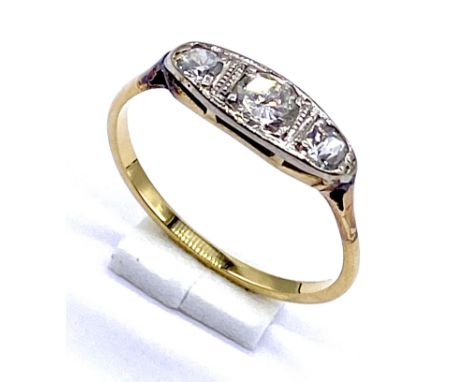 An 18ct gold (tested) diamond three stone boat ring, size J