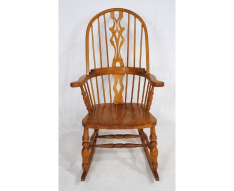 A Windsor style stick-back rocking chair