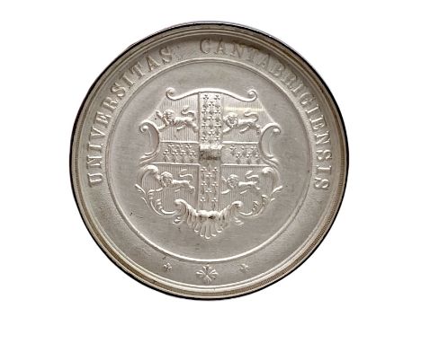 A Cambridge University frosted silver award for athletics with coat of arms to front and winged foot of Mercury within wreath