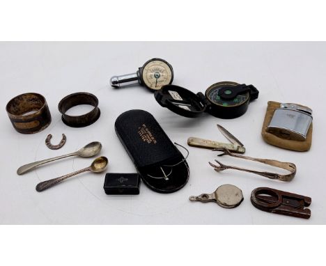 A collection of miscellaneous items to include silver sugar tongs, silver fruit knife, papier Mache snuff box etc.