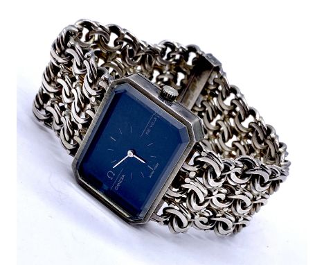 A vintage Omega De Ville gentleman's wristwatch with Andrew Grima silver bracelet, number 711 1909 with original blue Suede p