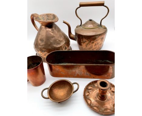 An antique copper gallon jug, copper kettle, Arts and crafts copper chamber stick etc.
