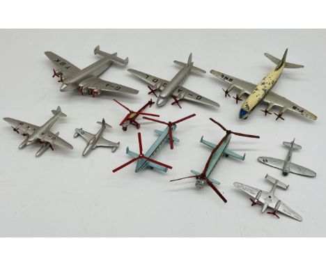 A small collection of Dinky Toys aeroplanes and helicopters including a Viking, Giant High-Speed Monoplane, Viscount, Seaplan