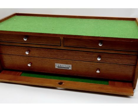 A vintage oak and chrome mounted collectors' chest, Gerstner International, with fall front revealing two short and two long 