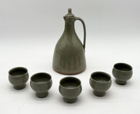 A set of five David Leach small cups along with a Leach standard ware lidded jug