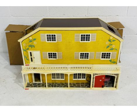 A boxed vintage Lundby "The Luxury Villa" Dolls House with a small selection of furniture (in two boxes, one box A/F)