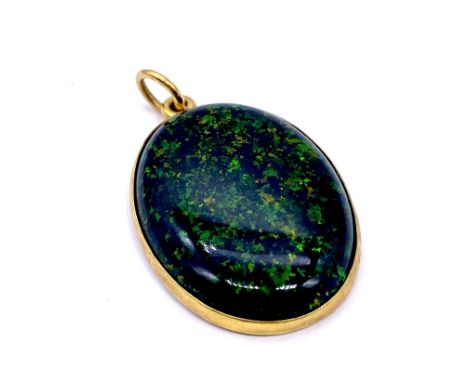 A 9ct gold pendant set with an opal doublet, pendant 3cm height