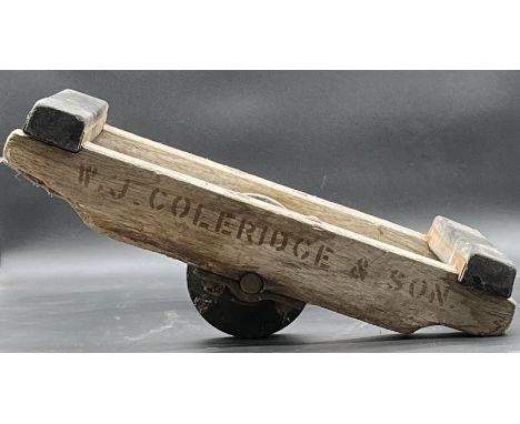 A vintage two-wheel Dolly cart/Trolley stamped W.J Coleridge & Son to one side and Teignmouth on the other.