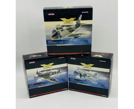 Three boxed limited edition Corgi "The Aviation Archive" detailed die-cast model military planes (1:72 Scale) including Canad