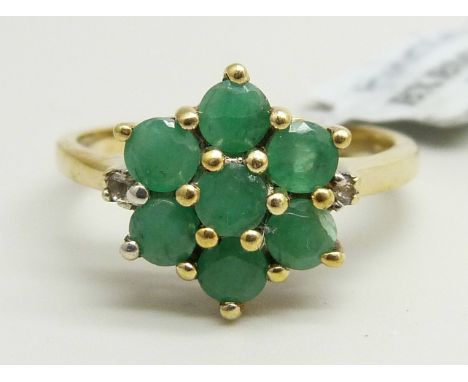 A silver gilt, emerald and white topaz cluster ring, R/S 