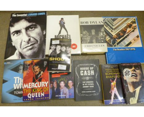 Eleven music books including Bob Dylan, Queen, The Beatles, etc. 