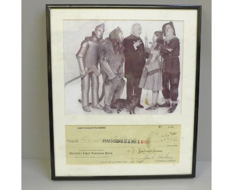 A Jack Haley (Wizard of Oz) autograph cheque and photograph display with Rutland Autographs AFTAL registered C.O.A. 