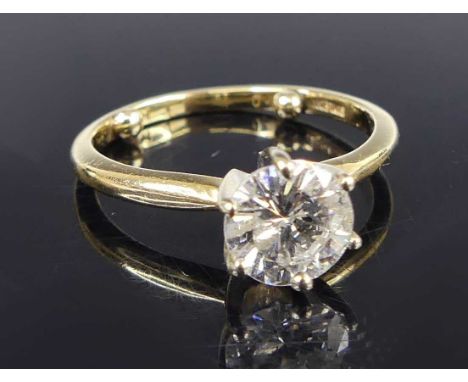 A contemporary 14ct gold diamond solitaire ring, the claw set round brilliant weighing approx 1.03 carats, colour assessed as
