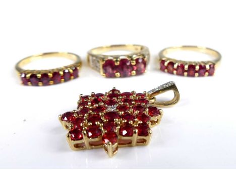 A modern 9ct gold Malawi ruby set half eternity ring, arranged as six oval cut rubies, total gem weight approx 0.86 carats, s