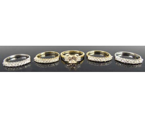 A modern 9ct gold Morganite and white sapphire set dress ring, the antique cushion cut Morganite weighing approx 0.49 carats,