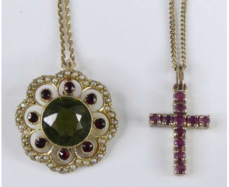 An early 20th century 15ct gold peridot, garnet and seed pearl set flowerhead pendant, the bezel set round cut peridot dia. 8