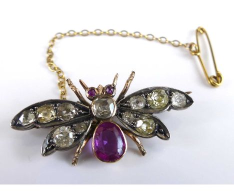 A late Victorian yellow and white metal, diamond and pink sapphire winged insect brooch, featuring five Old European cut diam