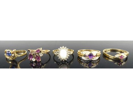 Five various 9ct gold precious and semi-precious set dress rings, comprising a modern amethyst and diamond point example, siz