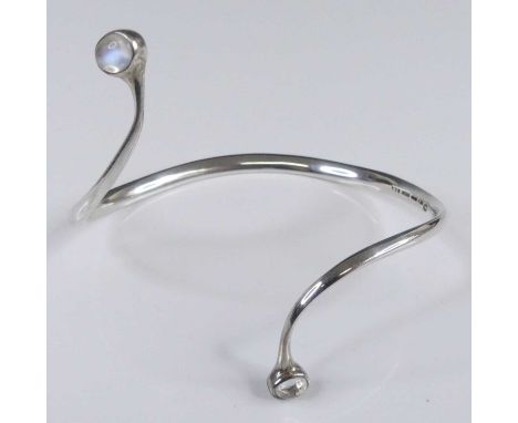 A Vivianna Torun Bulow-Hube for Georg Jensen Danish sterling silver and cabochon moonstone set bangle, design No. 924, stampe