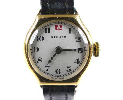 A vintage lady's Rolex 18ct gold cased wristwatch, having a signed champagne Arabic dial, manual wind 15-jewel movement, case