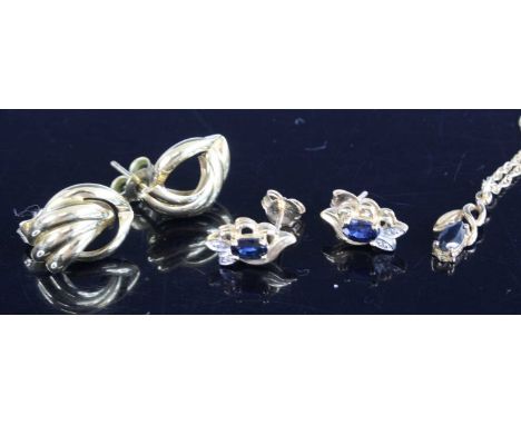 A pair of 9ct yellow gold, sapphire and diamond leaf shaped earrings, each comprising an oval sapphire and 2 single cut diamo