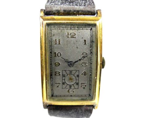 An Art Deco gent's 18ct gold cased tank watch, the silvered Arabic dial with subsidiary seconds dial at 6 o'clock, manual win