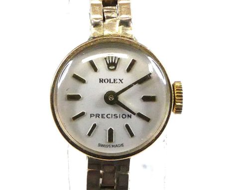 A 1960s lady's Rolex Precision 9ct gold cased wristwatch, having a signed champagne dial with baton markers, manual wind cal.