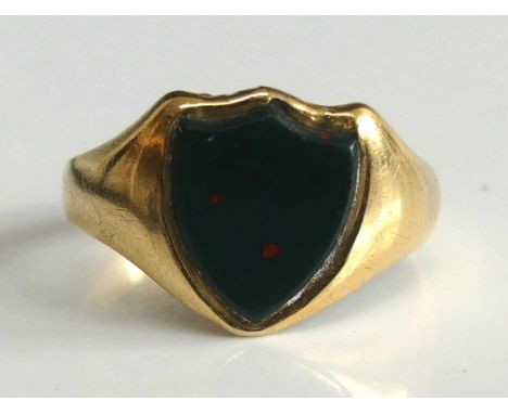 An 18ct yellow gold shield shaped bloodstone signet ring, the bloodstone measuring approx 10.6 x 8.6mm, size M, gross weight 