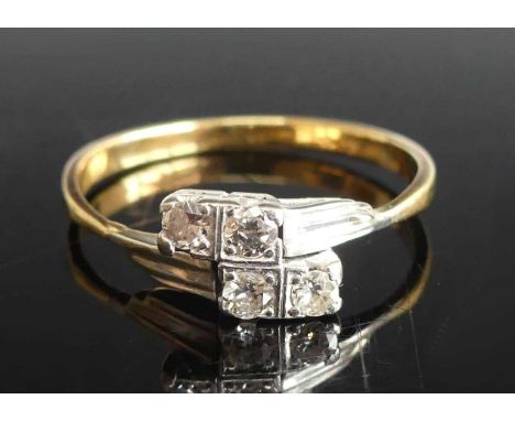 A yellow and white metal diamond crossover ring, featuring four Old European cut diamonds in claw settings, diamond dimension