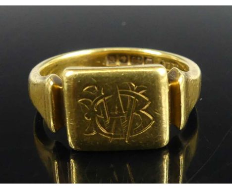 An 18ct yellow gold signet ring, the head engraved with a monogram SM, head dimensions 12 x 10mm, gross weight 11.2g, size S½