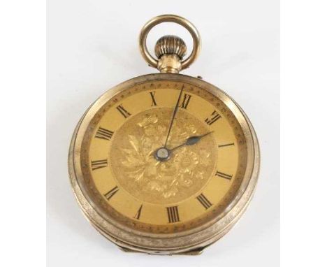 A 9ct yellow gold manual wind open faced pocket watch, having a gilded Roman dial with floral detail to the centre, inner cas