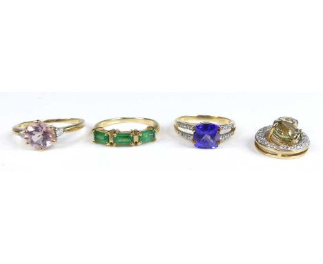 A modern 9ct gold tanzanite and diamond point set dress ring, the four-claw set antique cushion cut tanzanite weighing approx