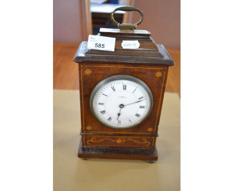 An Edwardian mantel clock with white dial signed B W Fase &amp; Co, Oxford Street, fitted with a brass movement marked BTG, s