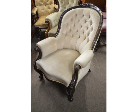 Victorian mahogany framed button upholstered armchair raised on short cabriole legs, 90cm high