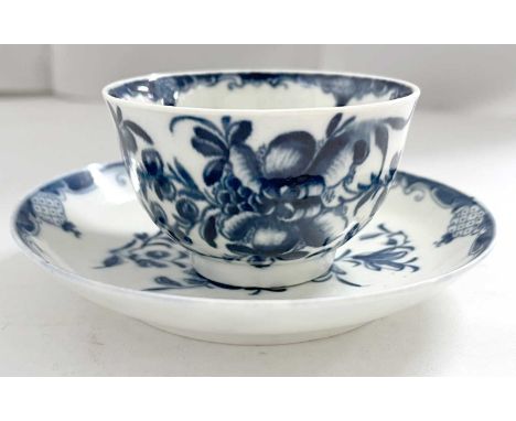 An 18th Century Worcester porcelain tea bowl and saucer with blue and white design