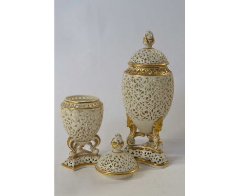 A Granger Worcester vase and cover with a pierced design together with a further vase and cover (non matching) with similar p