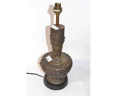 A 20th Century table lamp, the base formed as a Far Eastern brass vase