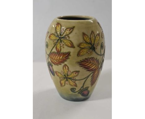 A Moorcroft vase of ovoid shape with tubelined floral decoration, the base signed by Emma Bossons dated 18.10.98, 13cm high